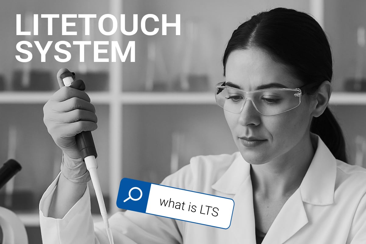 Black and white image of a focused female lab technician wearing safety glasses and gloves, using a pipette in a laboratory. The text ‘LITETOUCH SYSTEM’ is displayed at the top, and a search box with ‘what is LTS’ appears in the lower part of the image, emphasizing the ergonomic pipetting system.