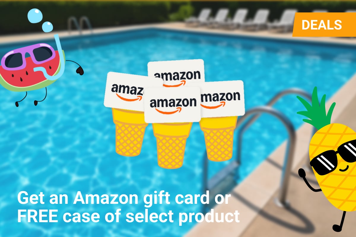 A bright, fun summer-themed promotional image featuring an outdoor swimming pool with lounge chairs in the background. In the foreground, animated characters of a pineapple and a watermelon with sunglasses and smiling faces flank a stack of Amazon gift cards popping out of yellow ice cream cones. An orange "DEALS" banner is in the top right corner. Text at the bottom reads: “Get an Amazon gift card or FREE case of select product.”